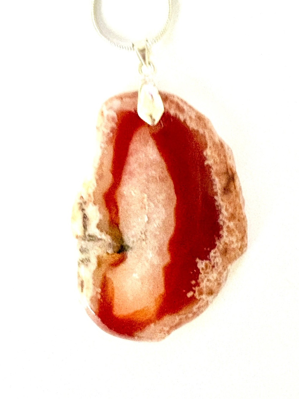 Natural, 2 inch, Geode Agate scliicr  a silver chain.